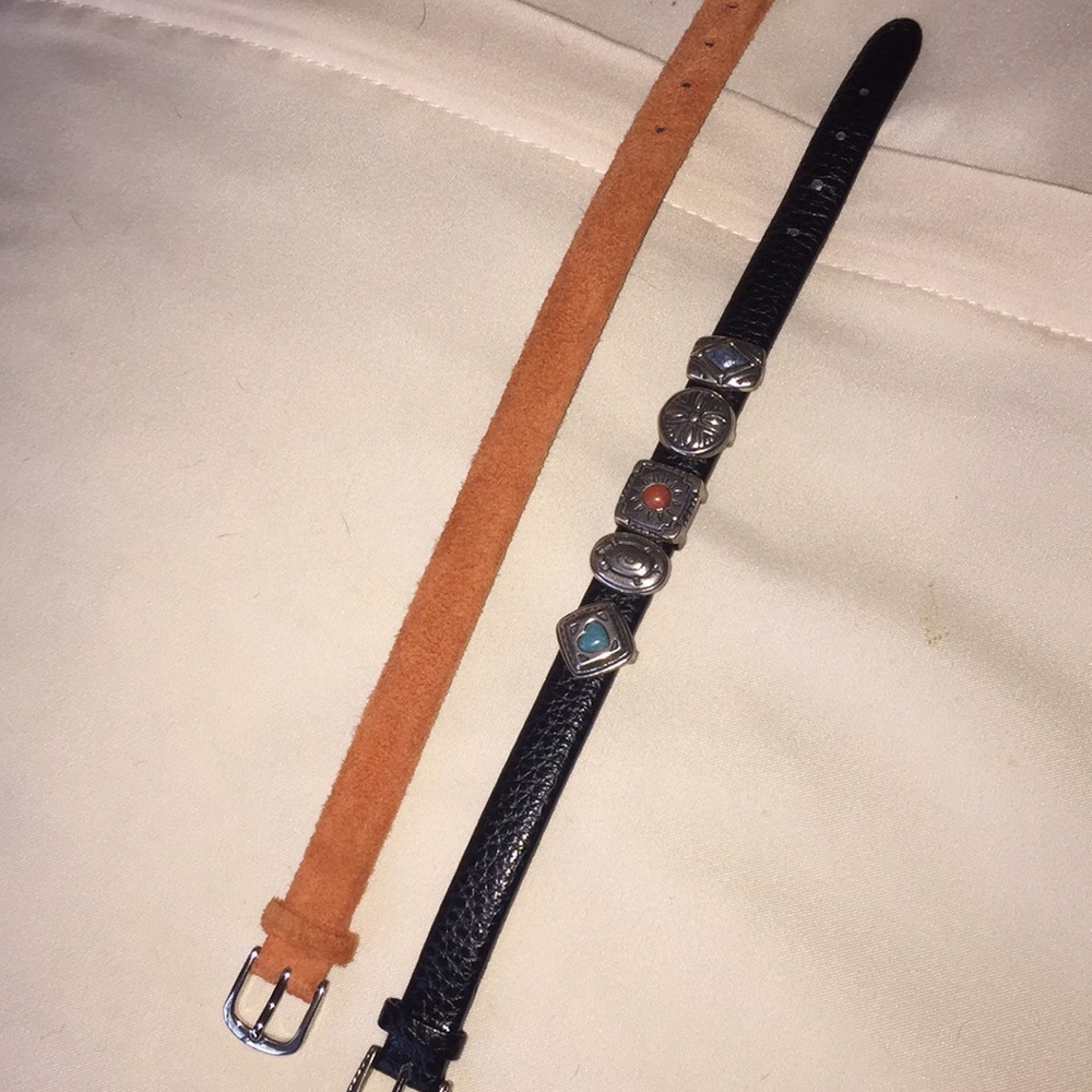 Ladies bracelets w charms.